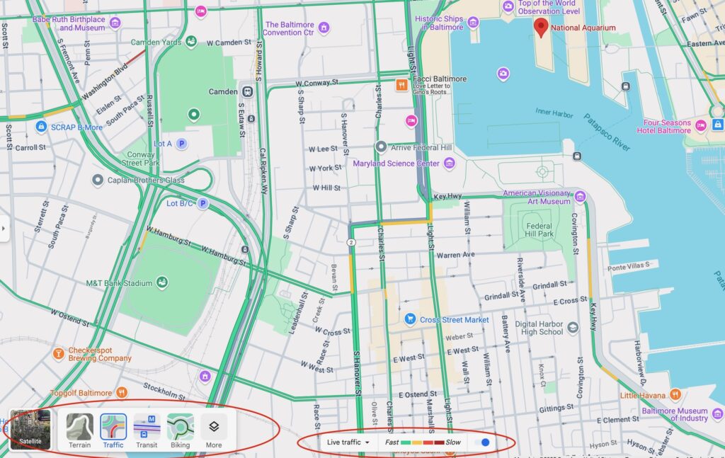 Google Map screenshot of Baltimore's Inner Harbor showing car traffic. Most of it is green showing little traffic.